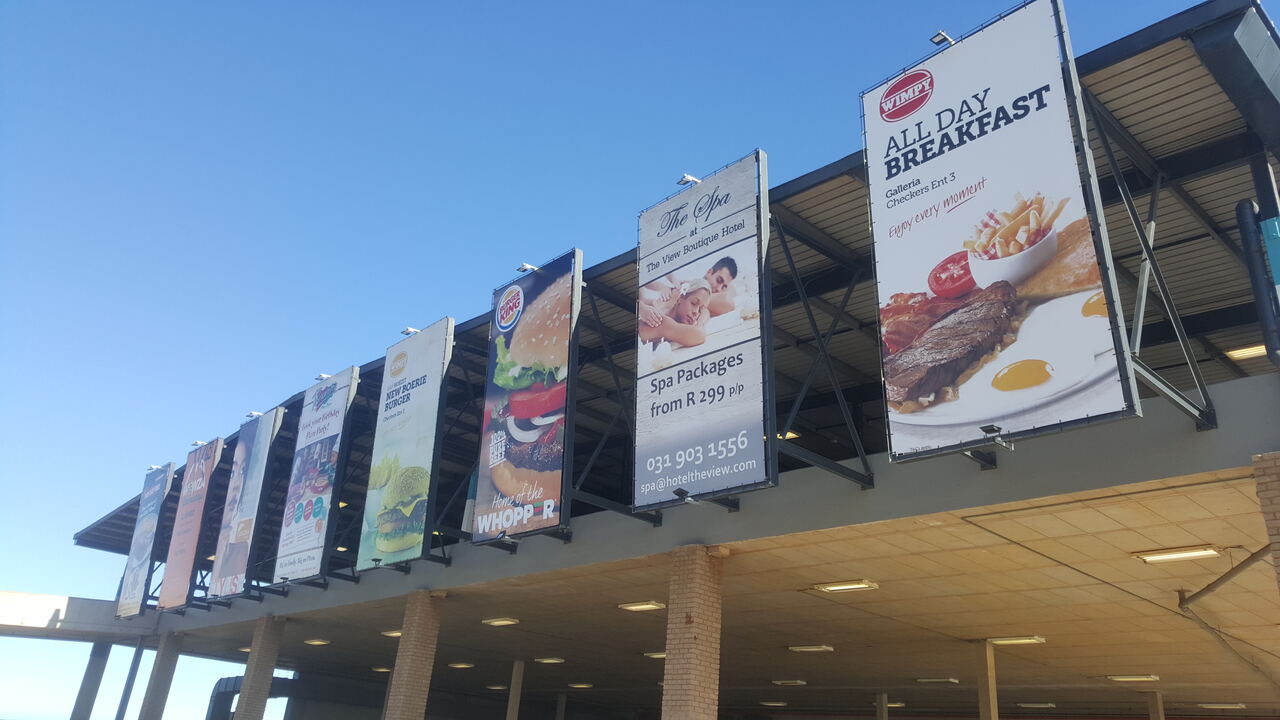 Retail centre banner parade signage