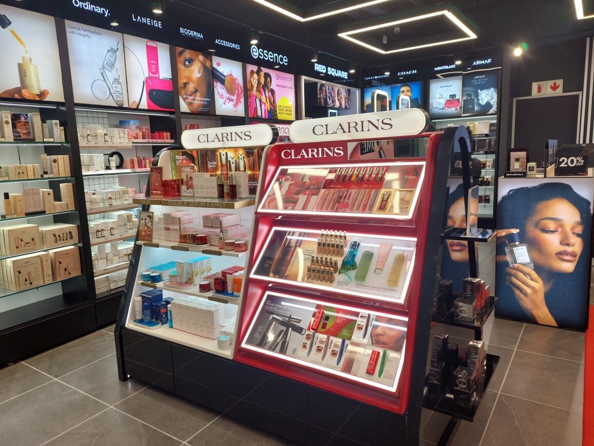 Clarins illuminated beauty counter signage
