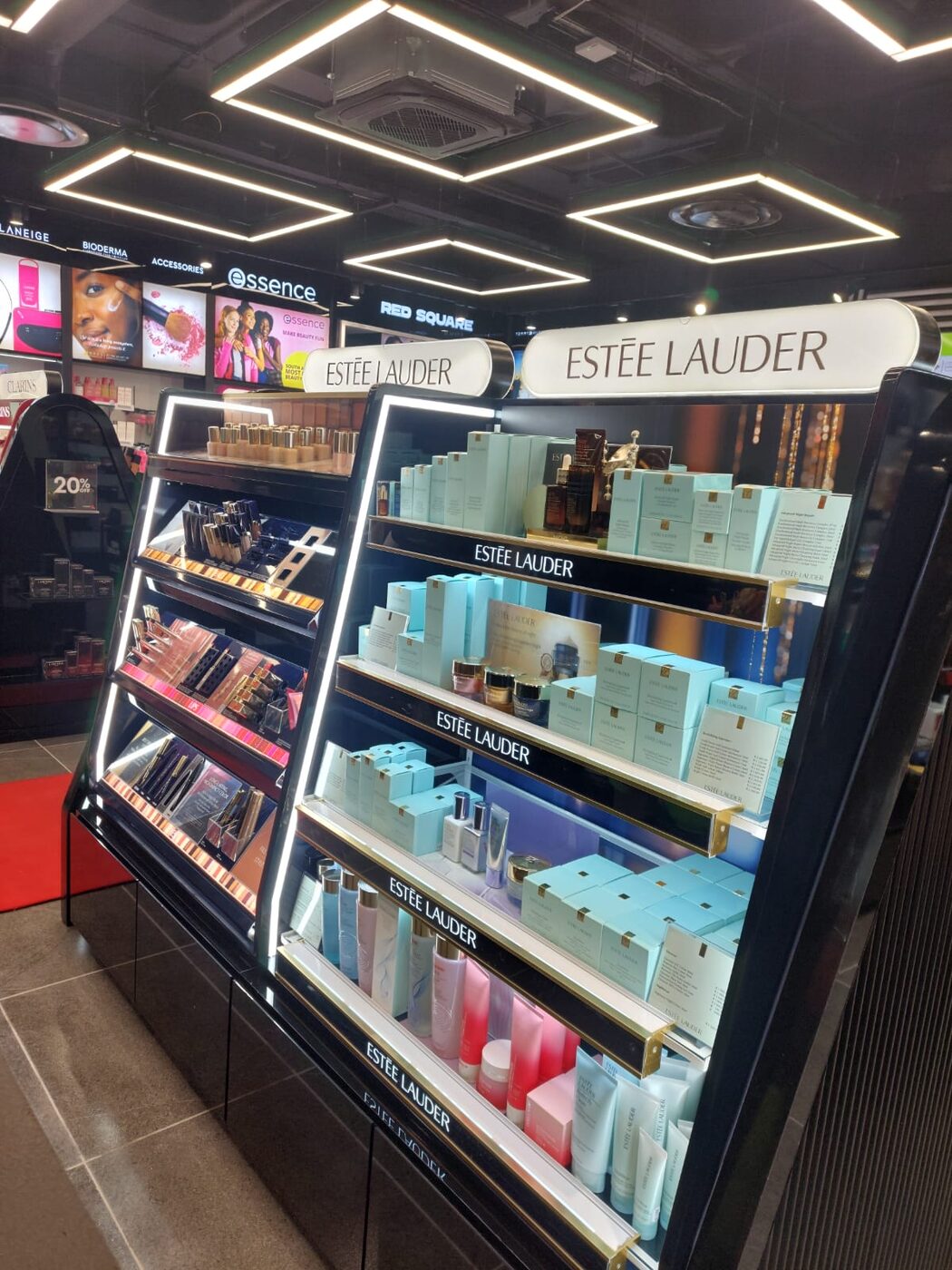 Estee Lauder illuminated beauty counter signage
