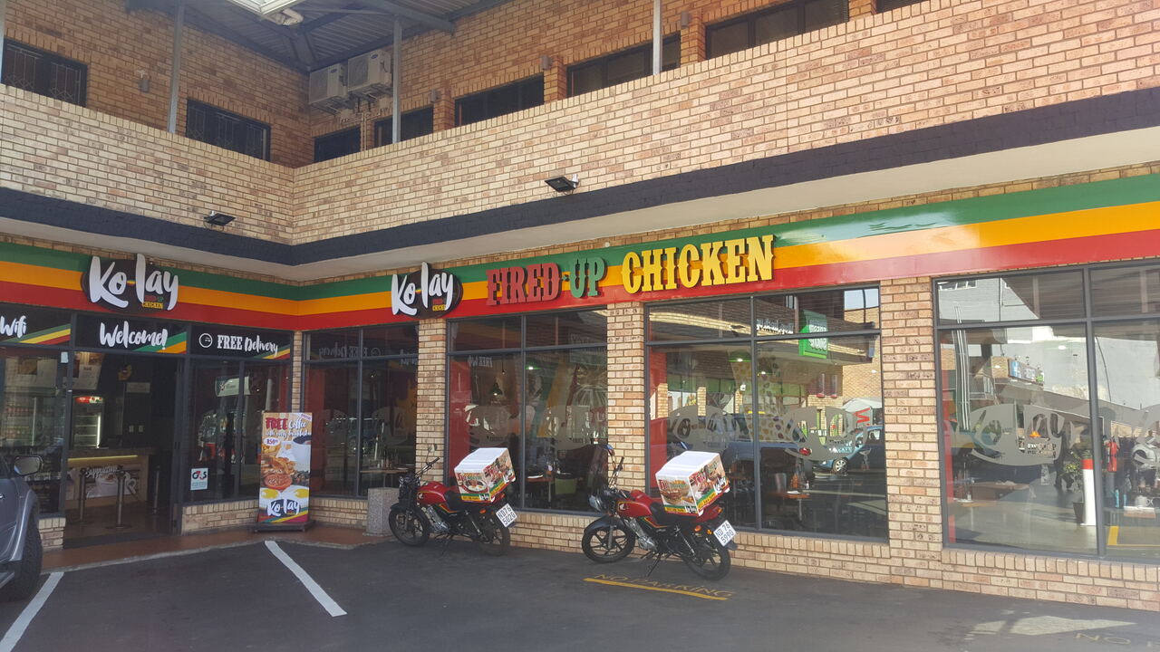 Kolay Fired-Up Chicken shopfront signage