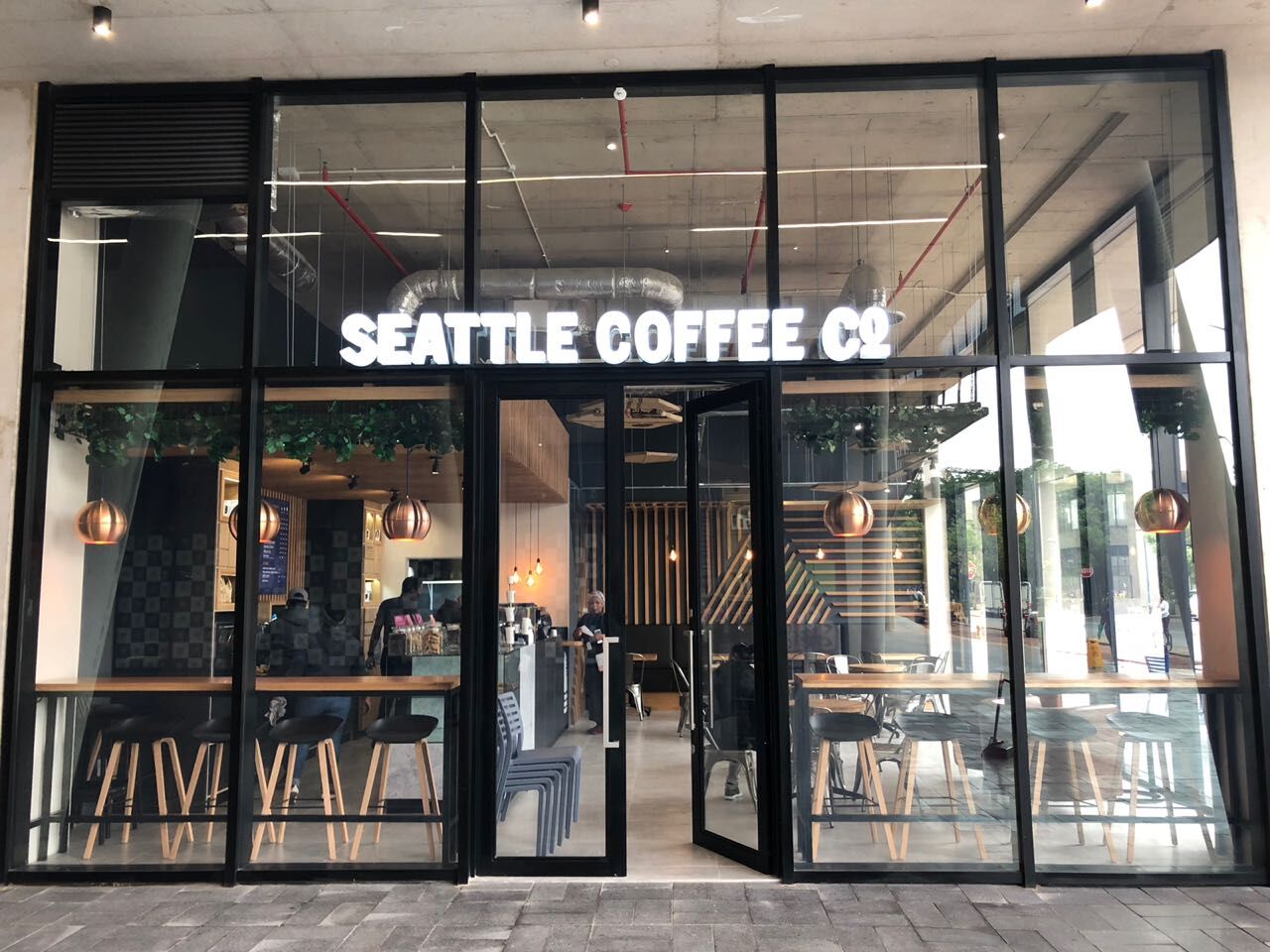 Seattle Coffee Co illuminated shopfront signage
